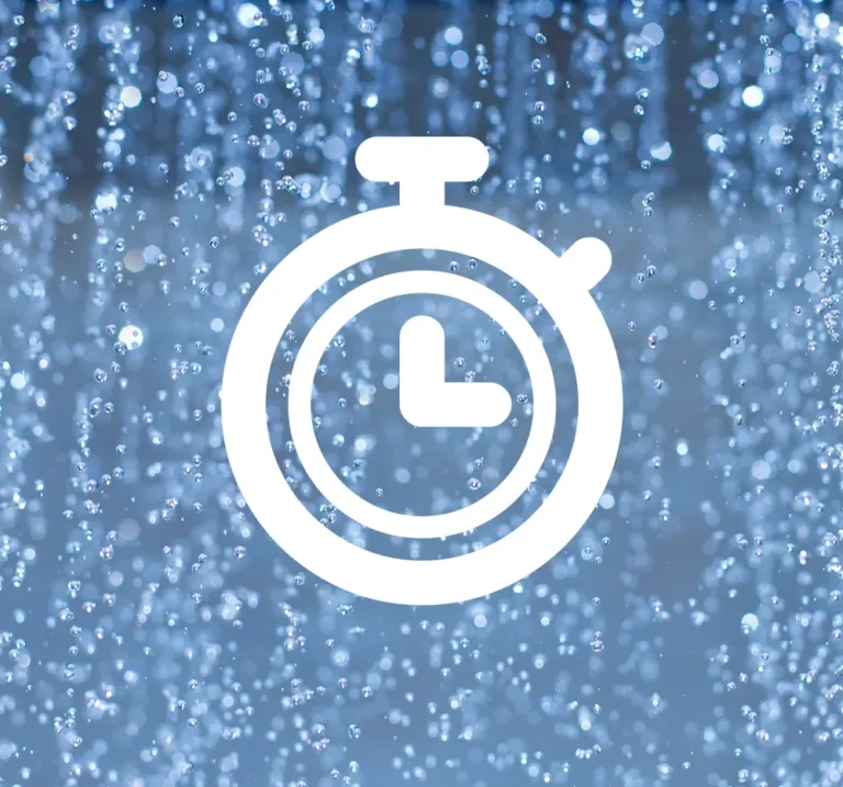 White stopwatch icon over blue water droplets