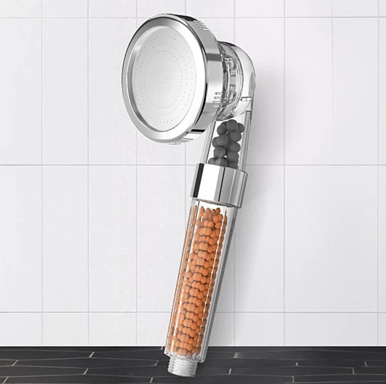 Chrome shower head with mineral bead filter handle