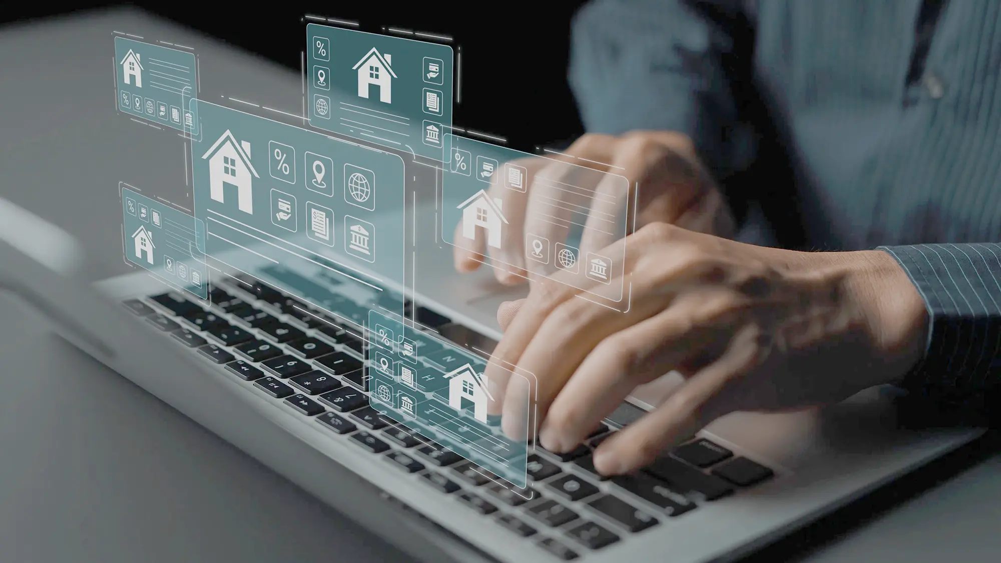 Person using online mortgage and property services on laptop